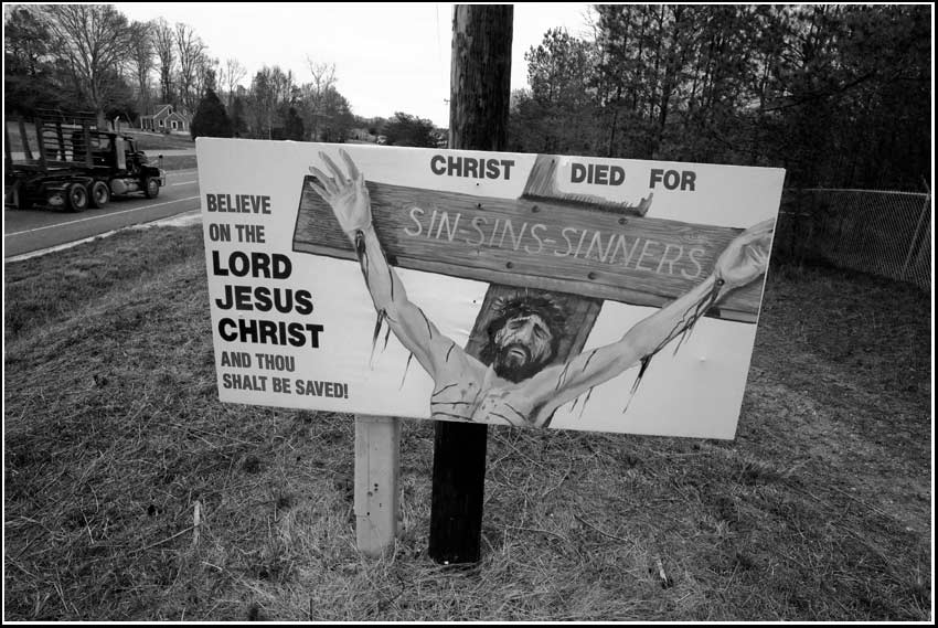 jesus on cross on billboard