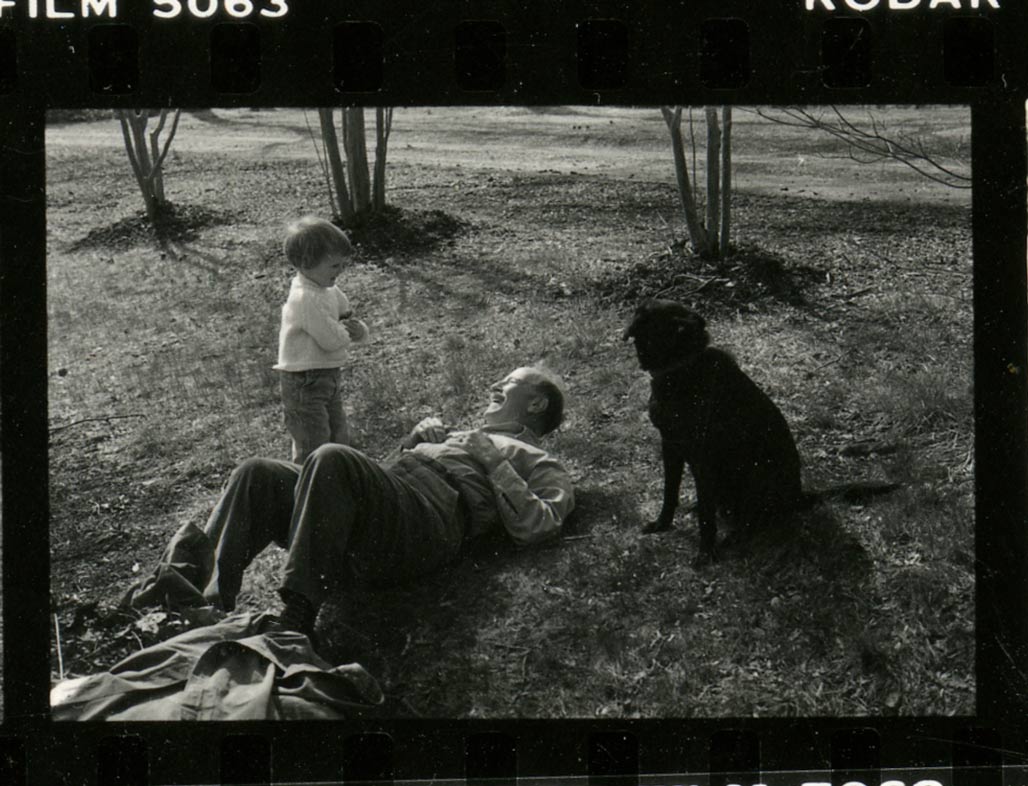 grandfather with grandson and dog